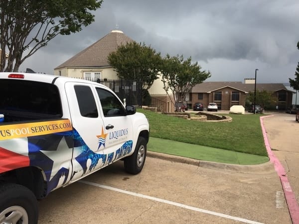 A truck parked by a client's home