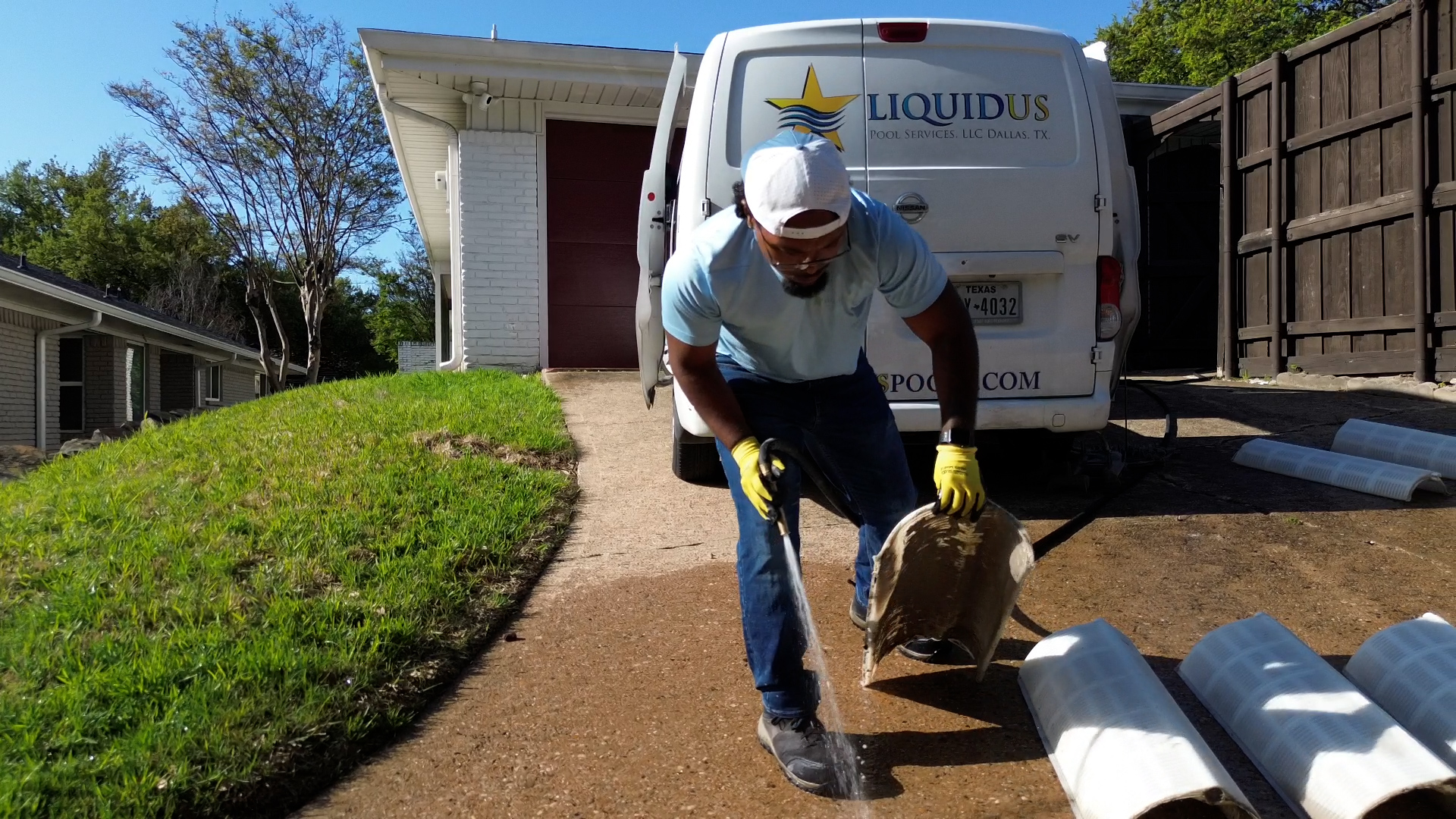 Pool filter cleaning in driveway